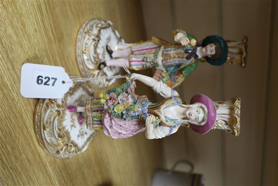 A pair of 19th century Minton figural candlesticks, height 24cm